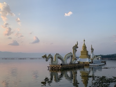 Phayao Lake at sunset with hills behind
