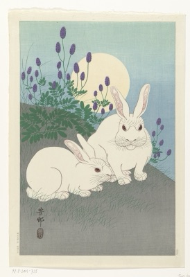 Japanese print of two white rabbits under a full moon with purple flowers