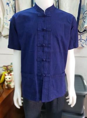 A dark blue mo hom shirt